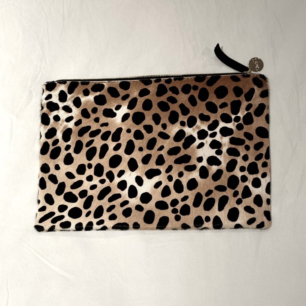 Clare V. Leopard pony hair clutch.